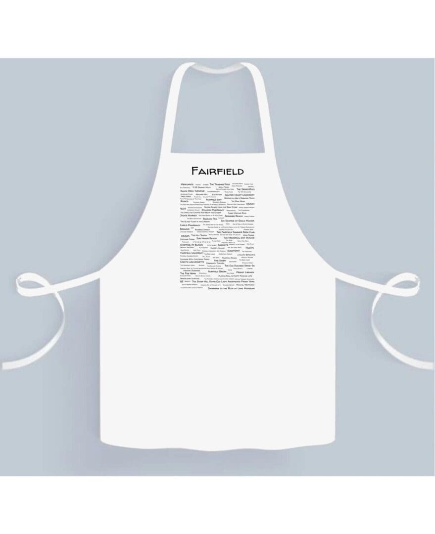 A white apron with the name of fairfield written in black.