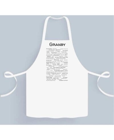 A white apron with the word gourmet written on it.