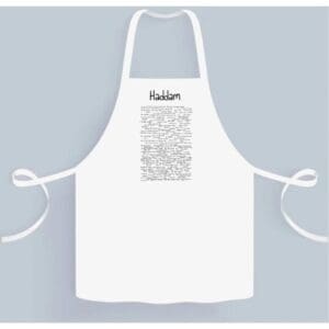 A white apron with the word " kitchen " written on it.