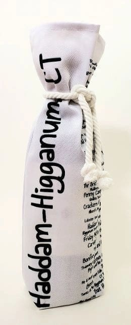 A white bag with black writing on it