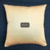 A pillow with the name of khadi on it.