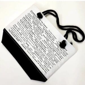 A white and black bag with words on it