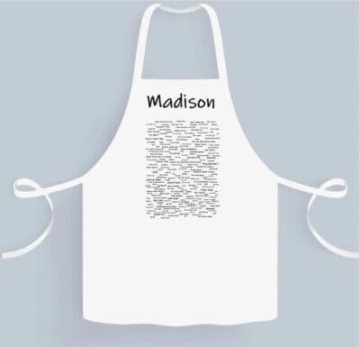 A white apron with the name of madison on it.