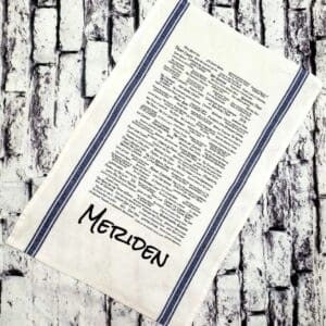 A tea towel with the name metziden written on it.