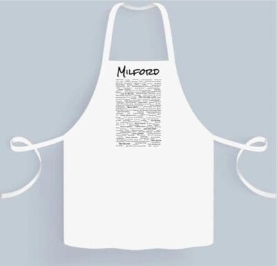 A white apron with the word " newspaper " written on it.