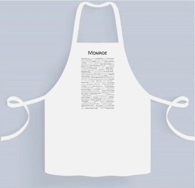 A white apron with the word " masque " written on it.