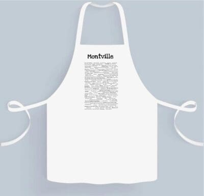 A white apron with the words nashville written on it.