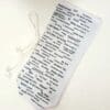 A white bag with words written on it