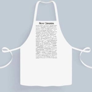 White New Canaan Pride Chef's apron printed on the front, displayed against a plain gray background.