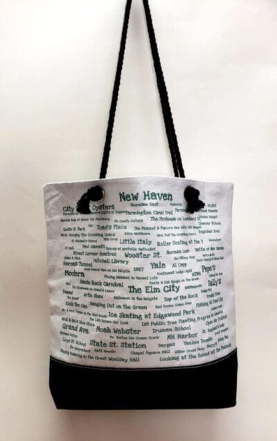 A bag with the words " new homes ".