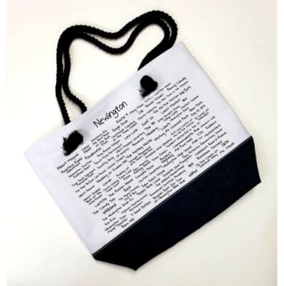 A bag with the word " newspaper " written on it.