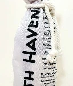 A white bottle bag with the name of a person on it.