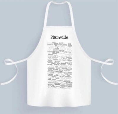 A white apron with many words written on it.