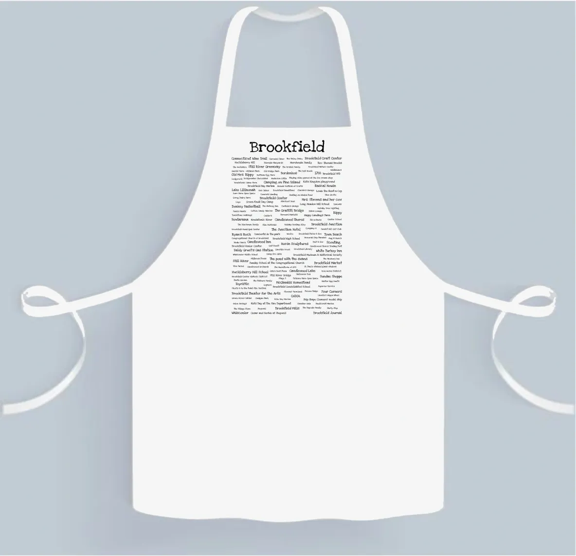 A white apron with the words " travelogist ".