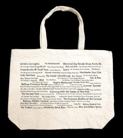 A white bag with many words written on it