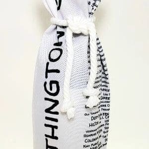 A white bottle bag with black writing on it.