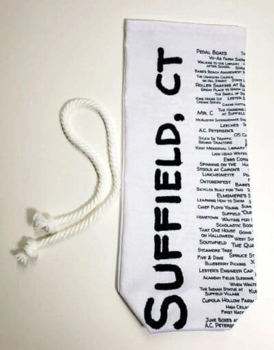 A white tie with the words suffield, ct on it.