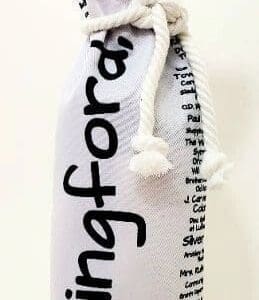 A white bottle with black writing on it