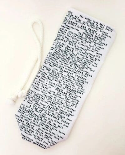 A tie with the words " the bible " written on it.