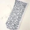 A white bag with black writing on it