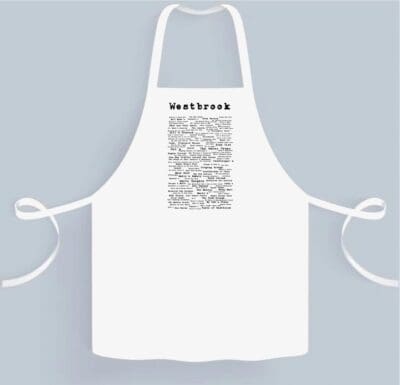 A white apron with black text on it.