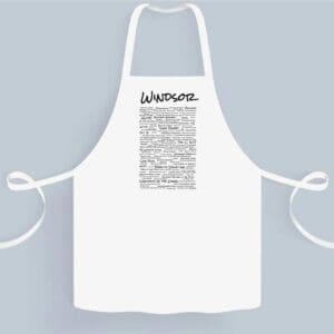 A white apron with writing on it.