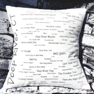 A pillow with many words written on it