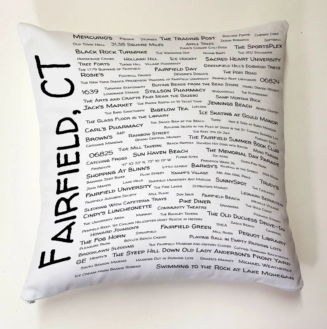 A pillow with the words fairfield, ct written on it.