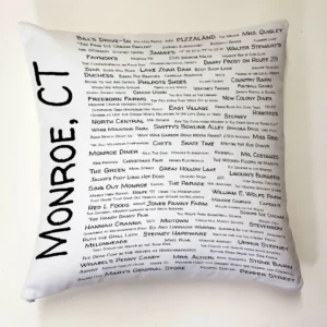 A pillow with the names of all the places in monroe, ct.