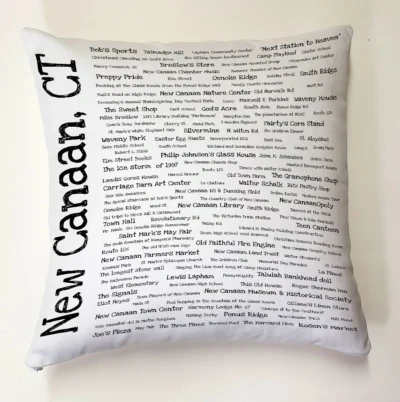 A pillow with the words " new canaan, ct ".