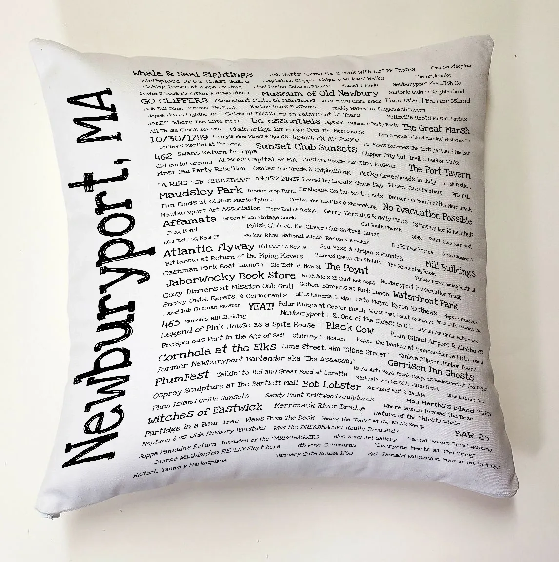 A pillow with the words " newburyport, ma ".