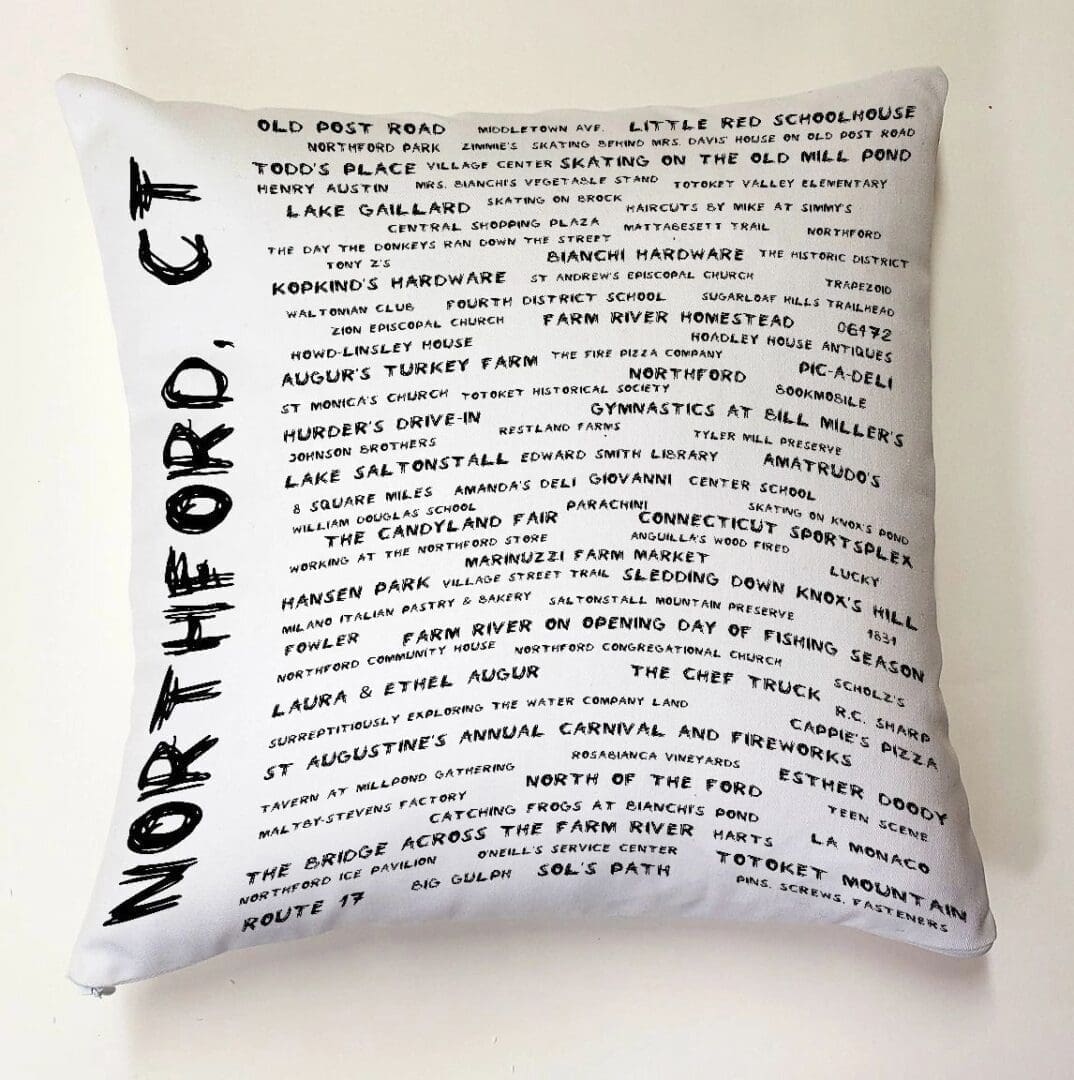 A pillow with the words northford, ct written on it.