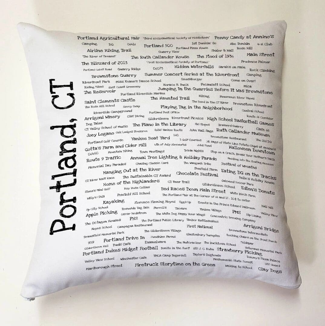 A pillow with the words " portland, ct ".