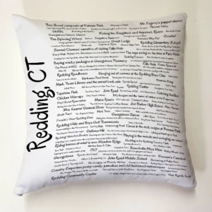 A pillow with the names of many people in it.