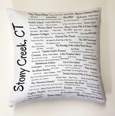 A pillow with many words written on it