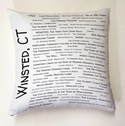 A white pillow with the words winsted, ct written on it.