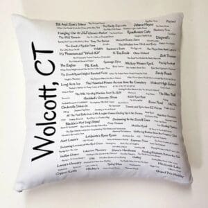 A pillow with the words wolcott, ct written on it.