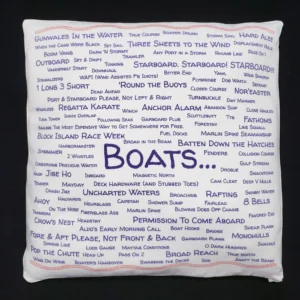 A pillow with the word boats written all over it.