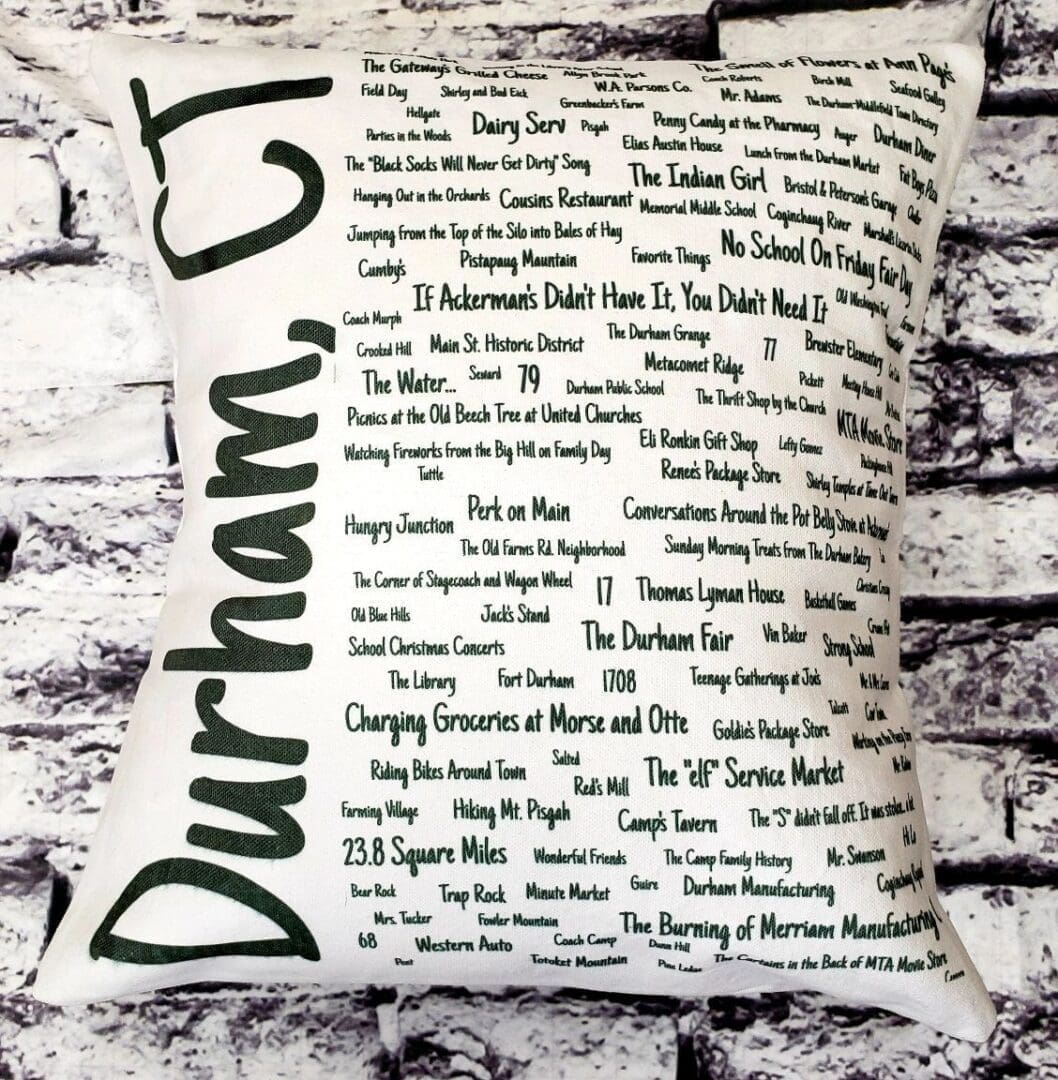 A pillow with the names of durham, ct.