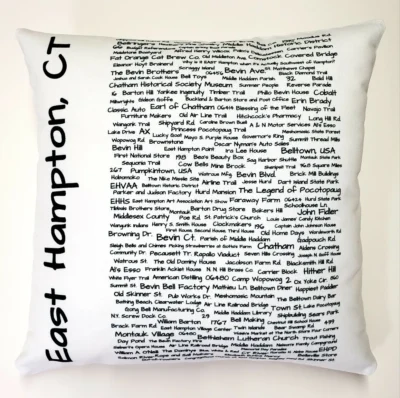 A pillow with the words east hampton, ct written on it.