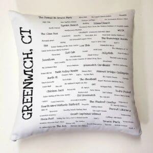 A pillow with the words greenwich, ct written on it.