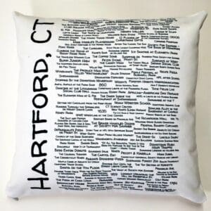 A white pillow with the words hartford, ct written in black.