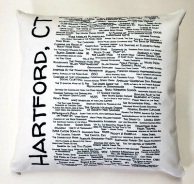 A white pillow with the words hartford, ct written in black.