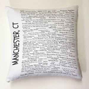 A white pillow with the words manchester, ct written on it.