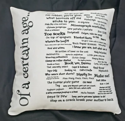 A pillow with words written on it.