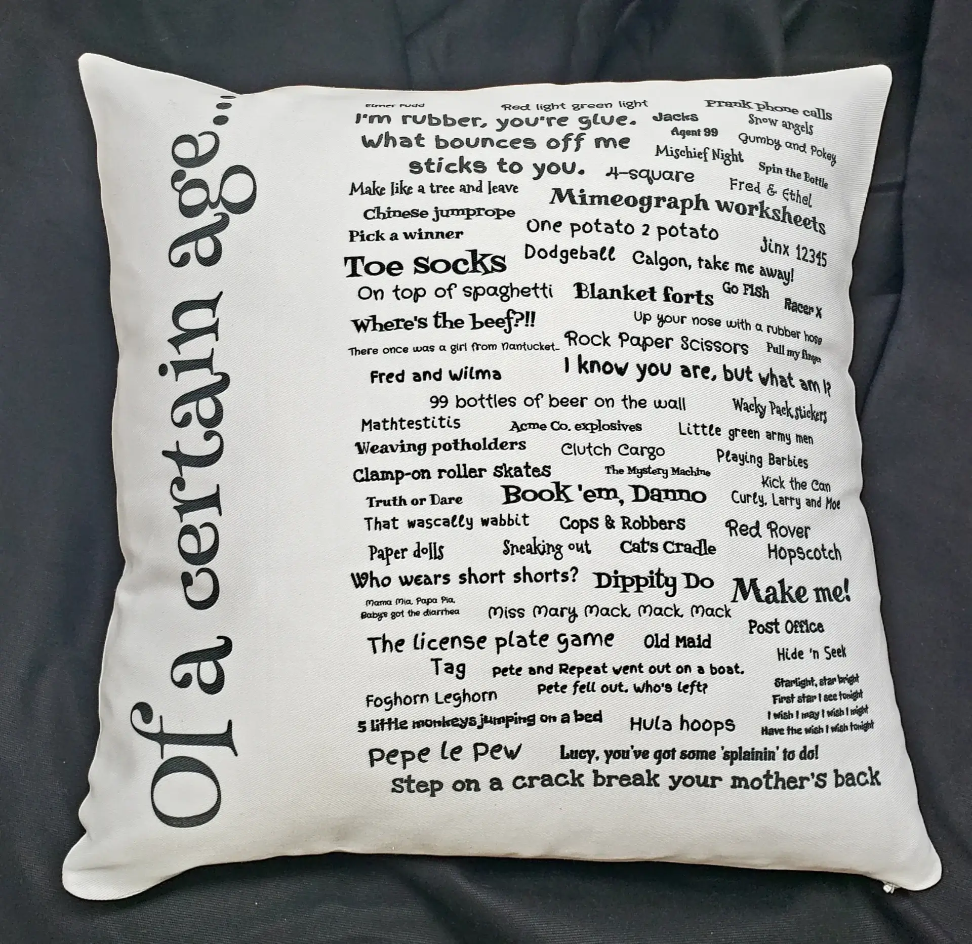 A pillow with words written on it.