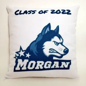 A pillow with a picture of a husky dog on it.