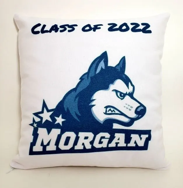 A pillow with a picture of a husky dog on it.