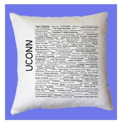 A pillow with the words uconn written on it.