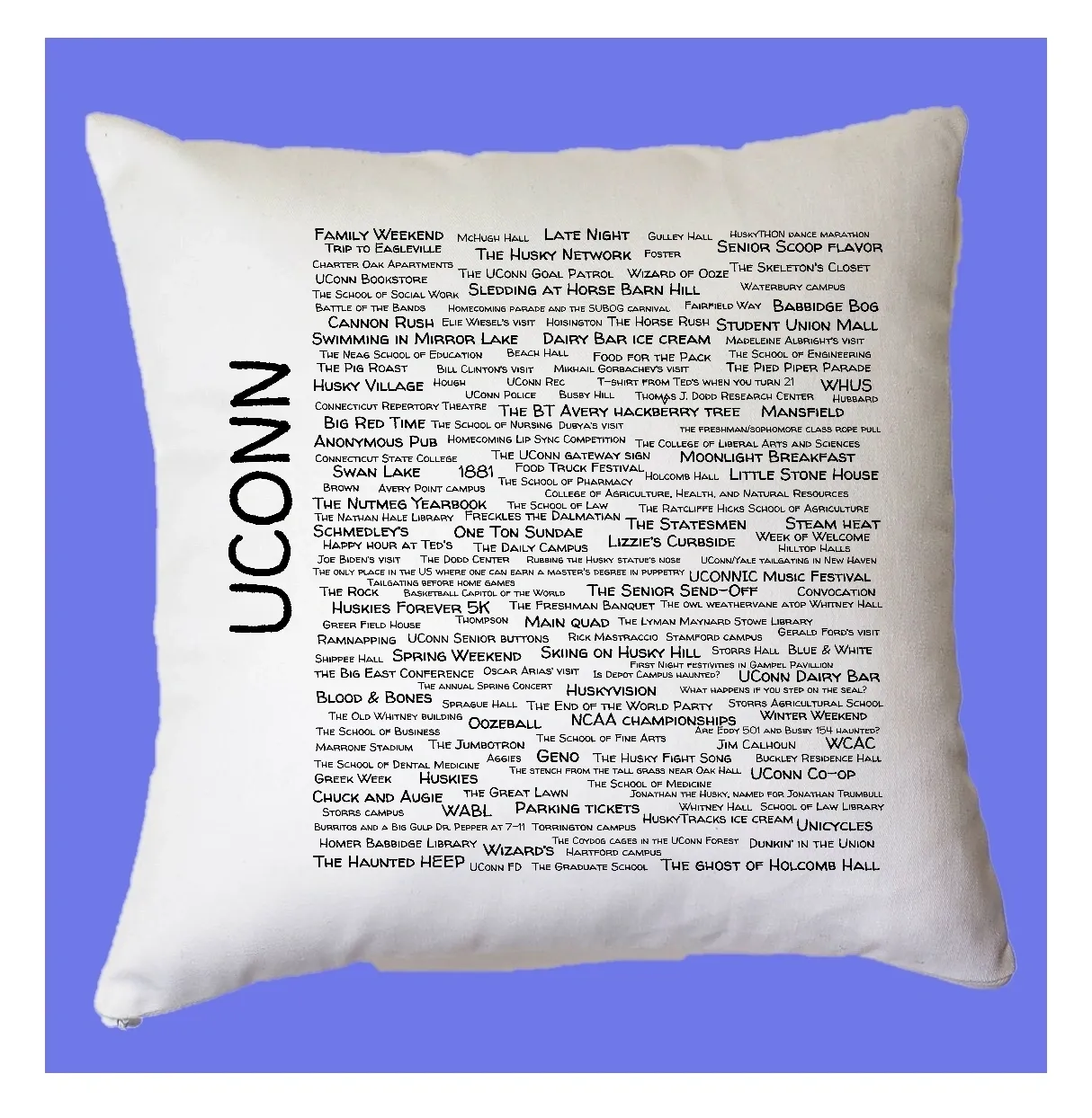 A pillow with the words uconn written on it.